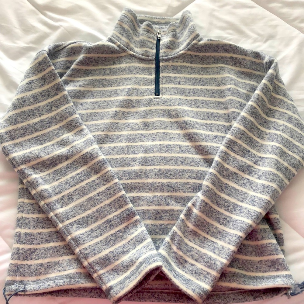 White and light blue turtleneck sweater